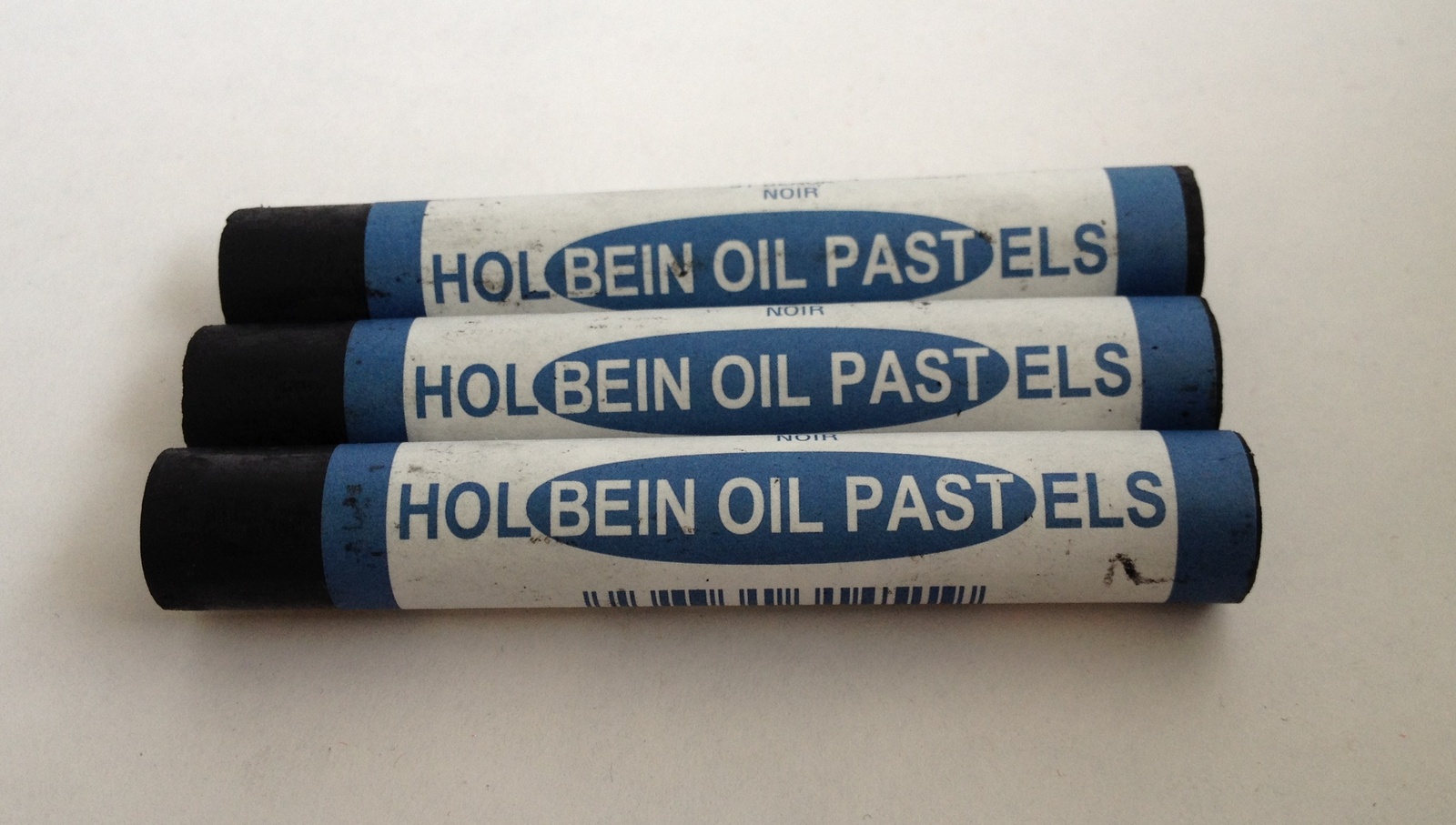 Holbein large round student oil pastels, well pigmented with smooth lay  down of colour. These pastel