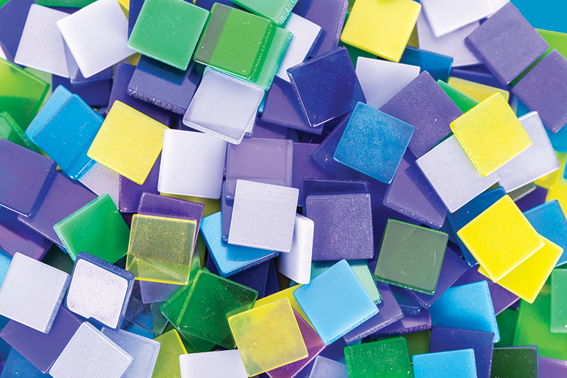 Small, plastic mosaics in assorted cool colours. 1cm square 150g